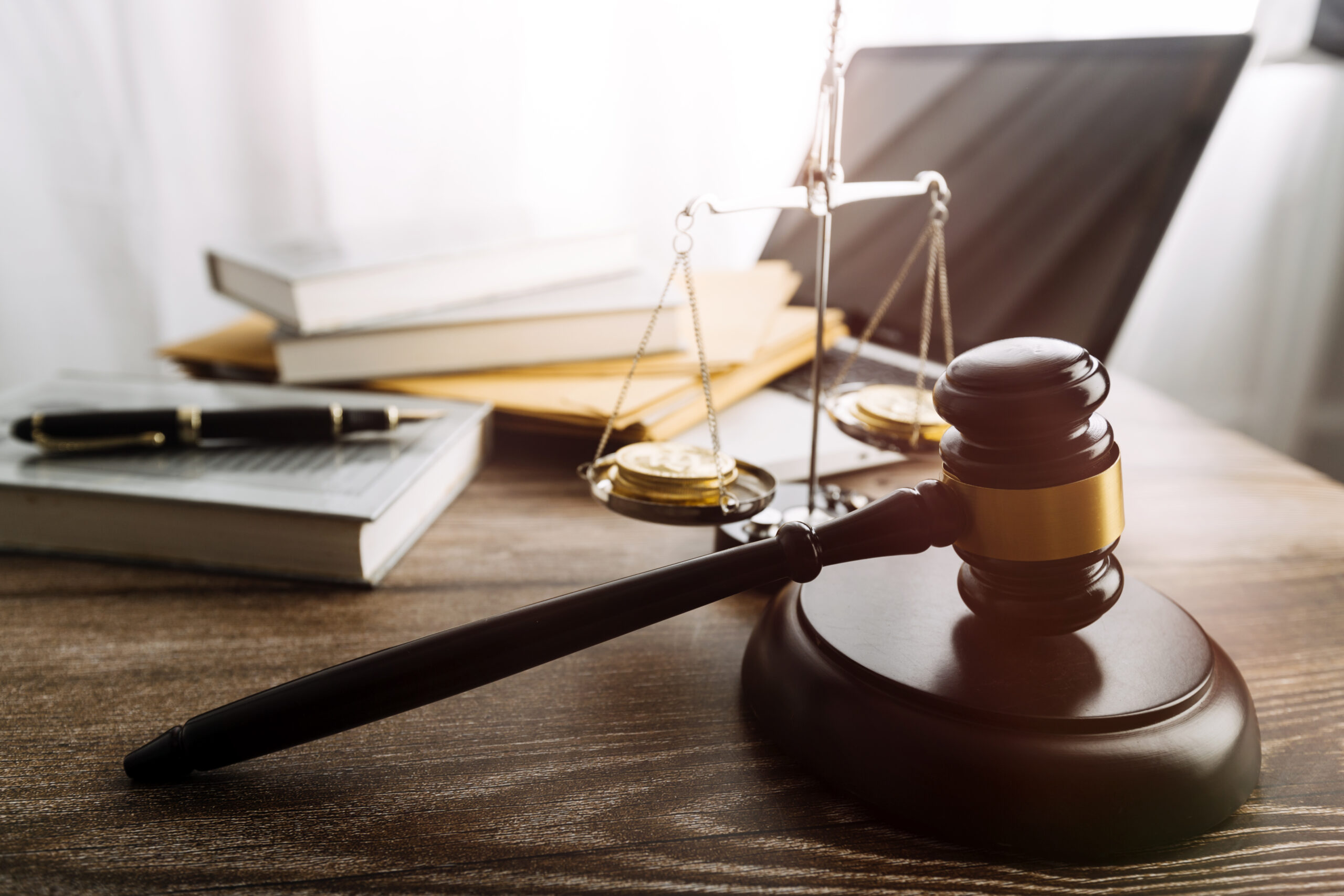 justice and law concept.Male judge in a courtroom on wooden tabl