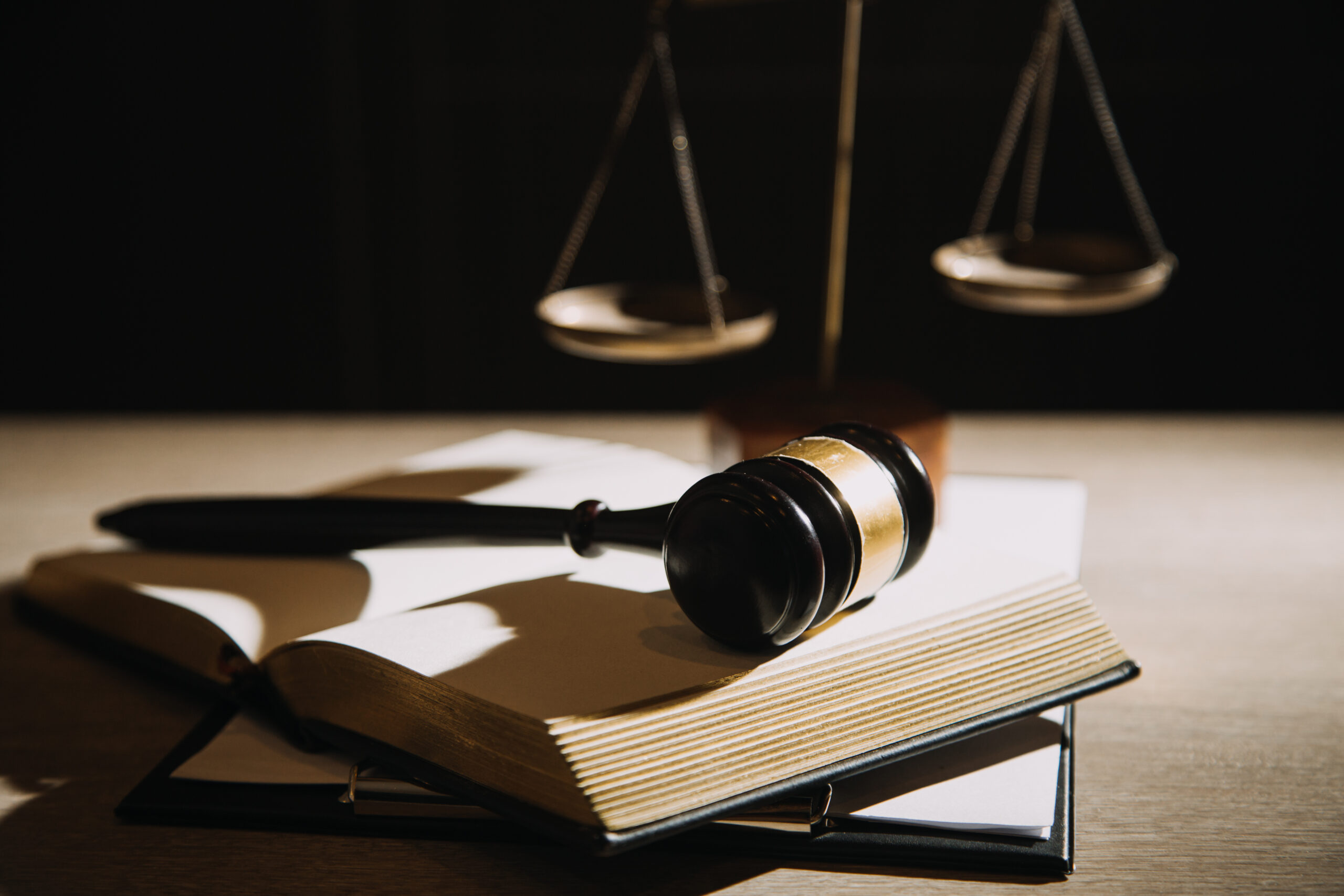 Justice and law concept.Male judge in a courtroom with the gavel