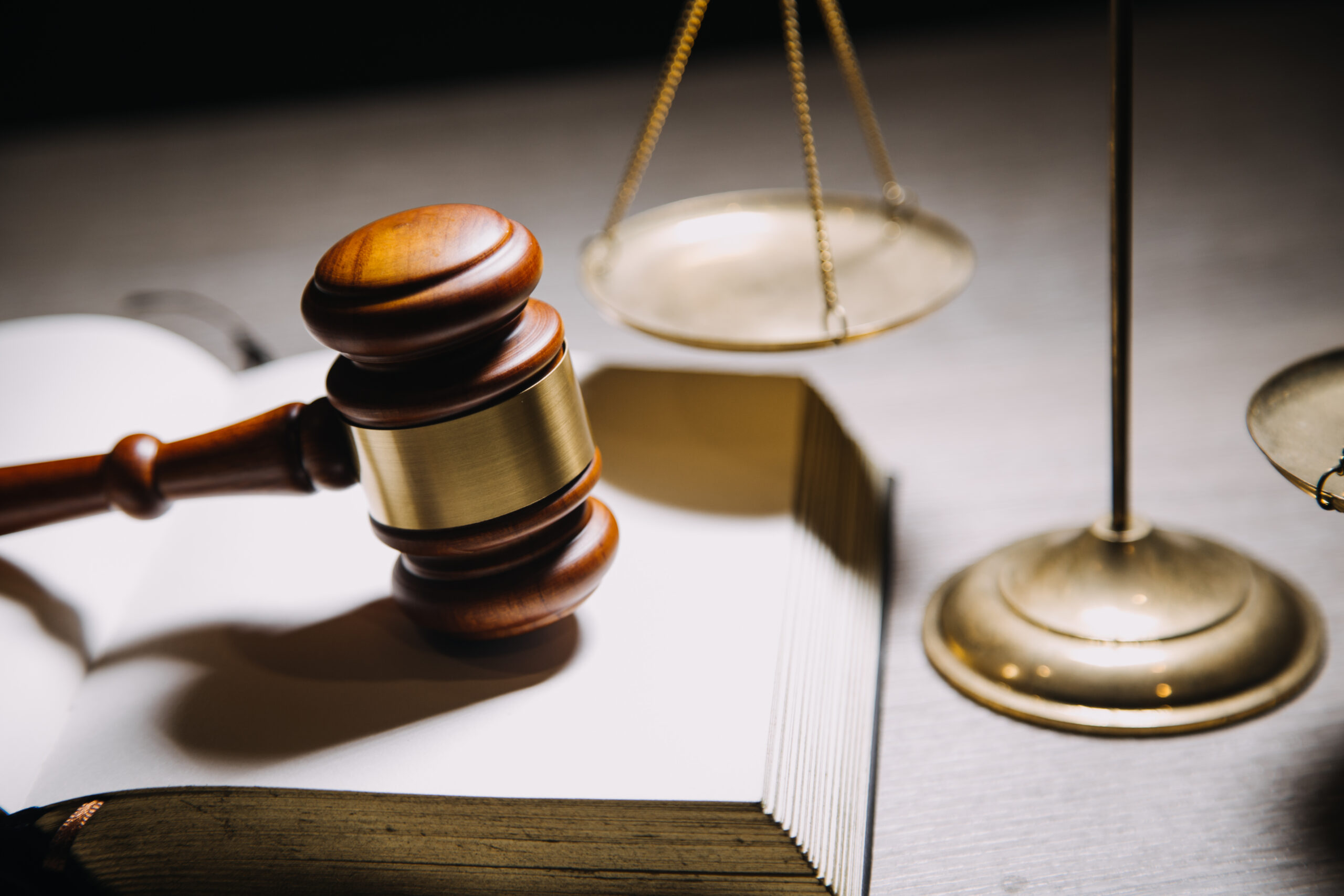 Justice and law concept.Male judge in a courtroom with the gavel