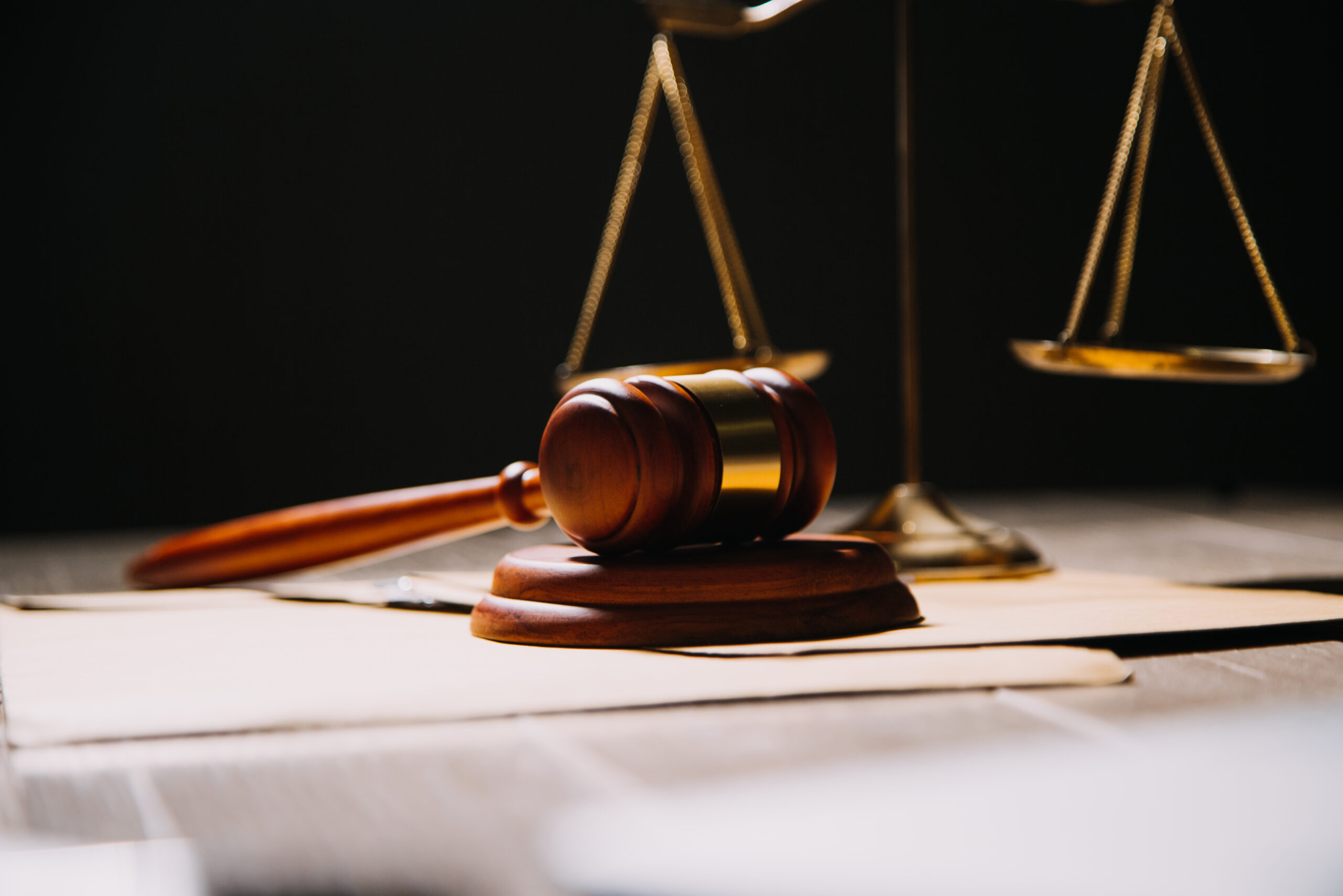 Justice and law concept.Male judge in a courtroom with the gavel